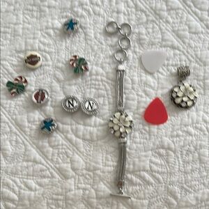 Silver Costume Charm Bracelet with White Flower and additional charms